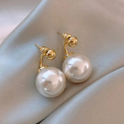 Classic White Pearl & Curved Gold Earrings