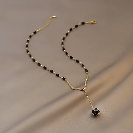 Vintage Gold Black Bead Drop Necklace