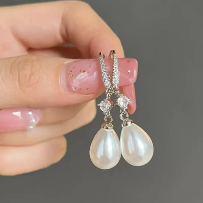 Bright Dangling Pearl Earrings